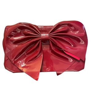 Never used, red bow clutch!
